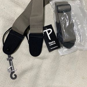 2 gray guitar straps